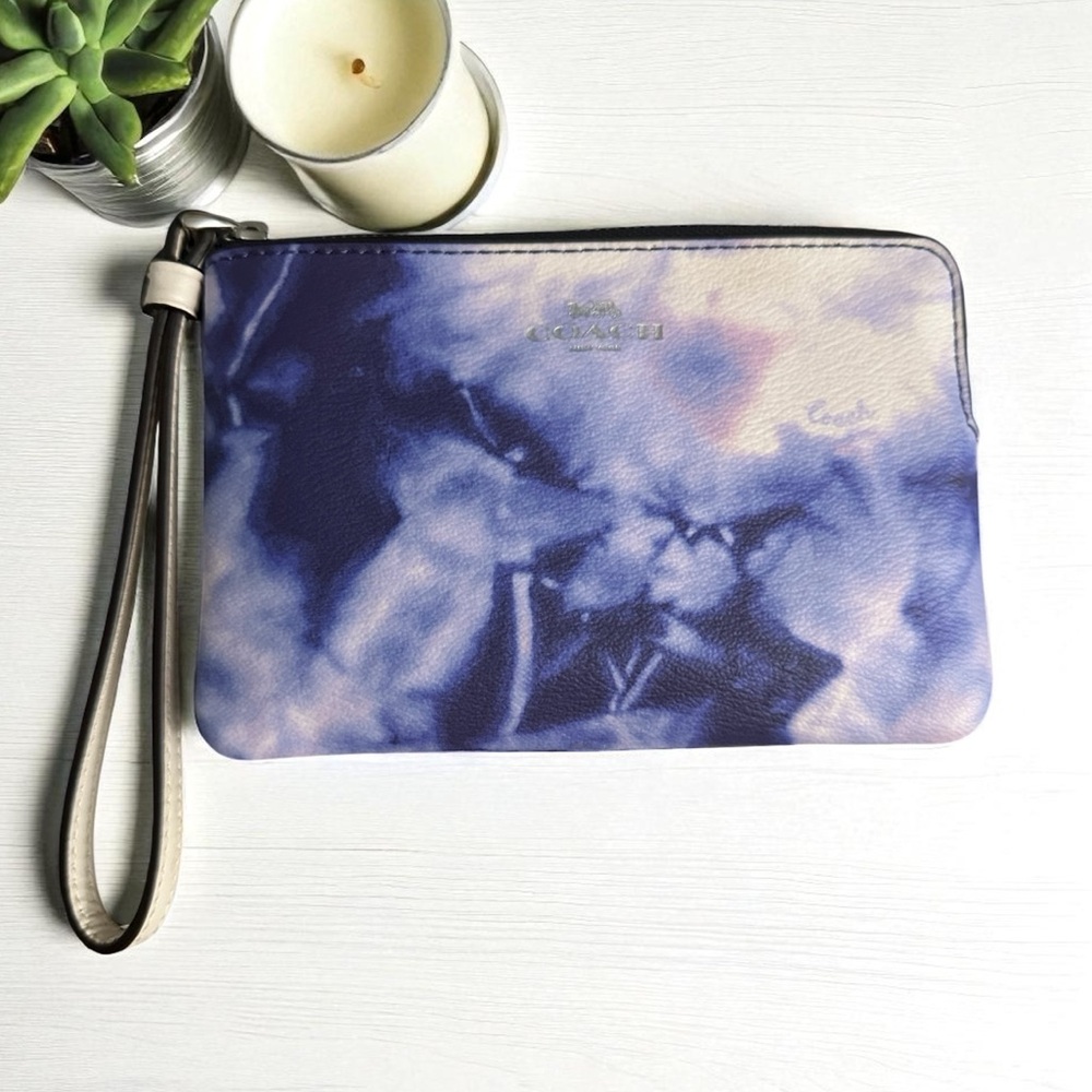 Coach tie-dye wristlet in pink, purple, blue and white hues! Excellent Condition